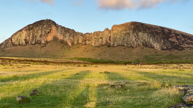 sunriseonhillsshadowsofmoaiinforeground.jpg